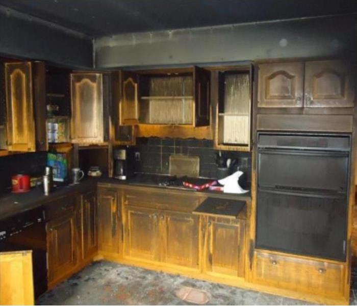 a soot and fire damaged kitchen